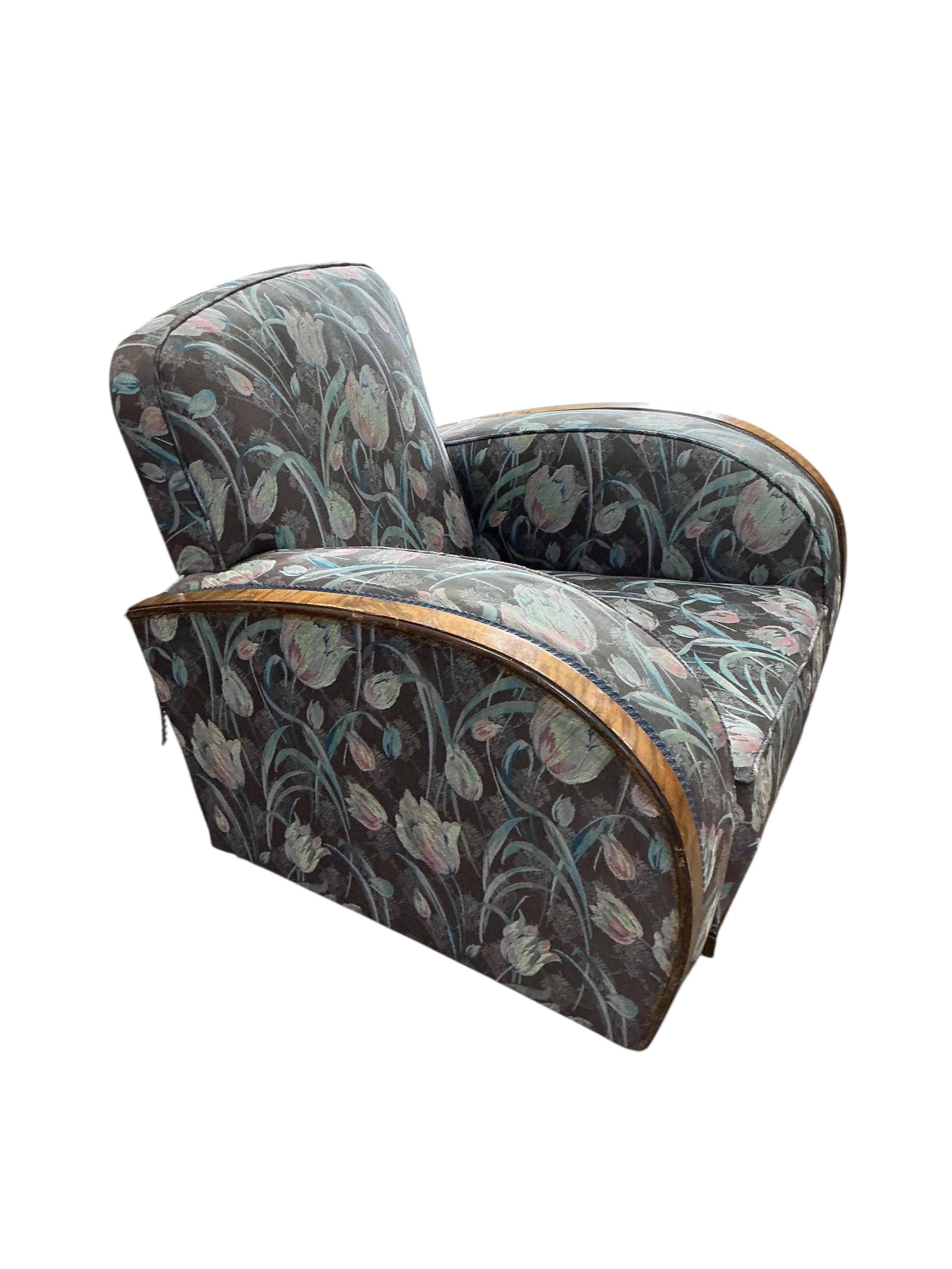 An Art Deco walnut and simulated walnut armchair, width 87cm, depth 82cm, height 78cm